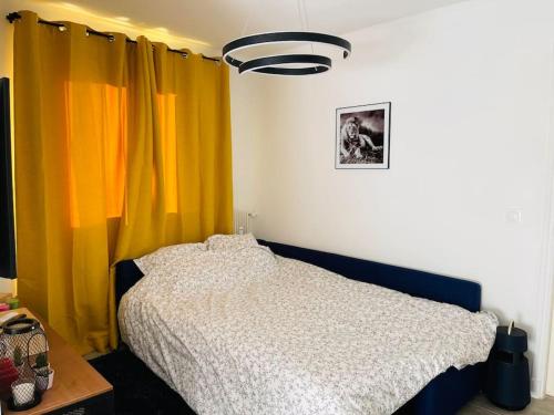 Ein Bett oder Betten in einem Zimmer der Unterkunft Superbe T3 - 11 minutes Palais, Croisette & Plages