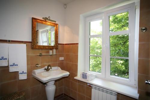 Koupelna v ubytování Aparthotel Stora Antis