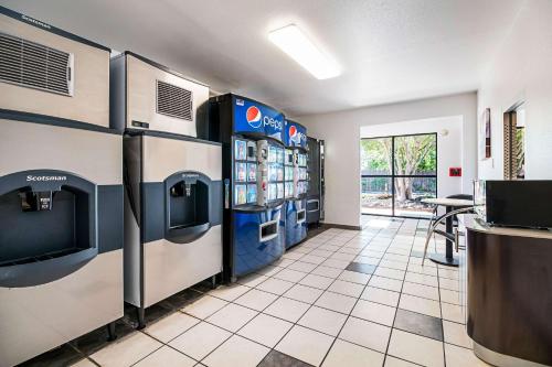 a room with two vending machines in a store at Motel 6-Corpus Christi, TX - Northwest in Corpus Christi