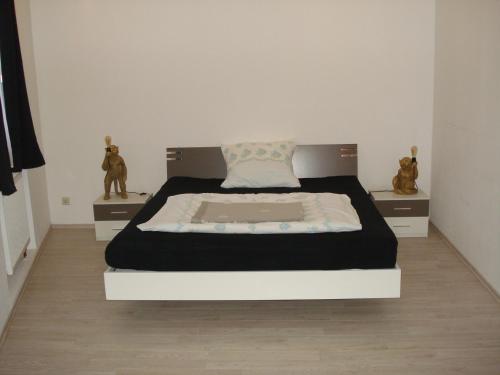 En eller flere senge i et værelse på Appartement 45 qm mit Bad an der Mosel - Nähe Koblenz