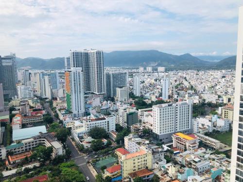 an aerial view of a city with tall buildings at Gold Coast Luxury Apartment Nha Trang in Nha Trang