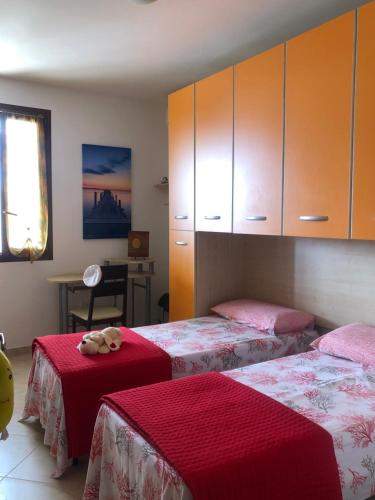 Una cama o camas en una habitación de Dimora del Sole