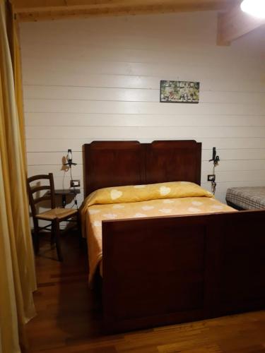 En eller flere senge i et værelse på Colle Bianco