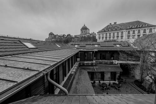 a black and white photo of the roofs of a building at Bazilika alatt Panzió in Esztergom