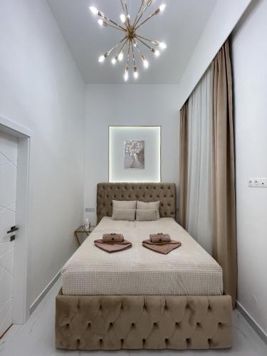 Cama o camas de una habitación en St Stephen Luxury Suit with Jacuzzi and Sauna