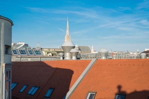 Nespecifikovaný výhled na destinaci Vídeň nebo výhled na město při pohledu z hotelu