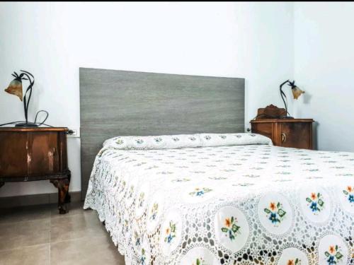 Postel nebo postele na pokoji v ubytování TENERIFE LITTLE VILLAGE 1D
