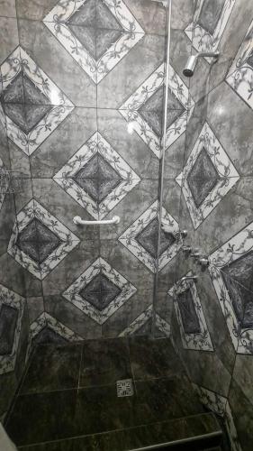 a ceiling of a shower with a tile floor at Providencia alquiler temporario-turístico in Paraná