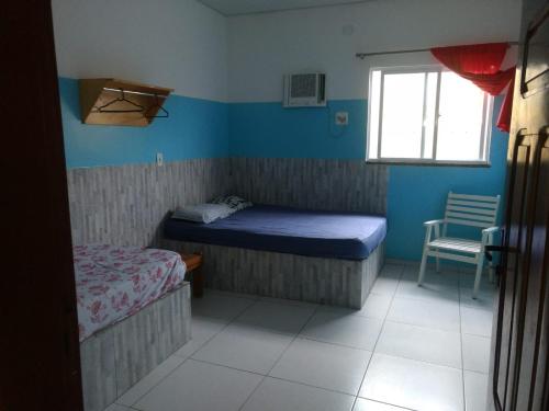 Postel nebo postele na pokoji v ubytování casa atalaia