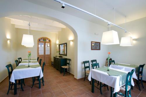 Restaurant o un lloc per menjar a Hotel Es Mercadal