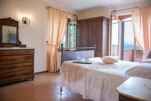 Giường trong phòng chung tại Tenuta Macetona