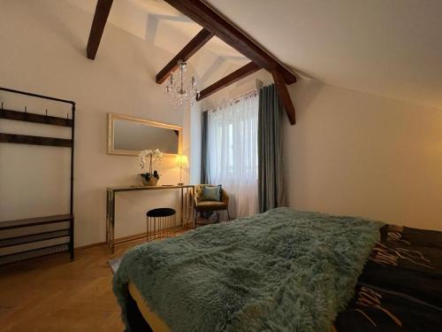 Llit o llits en una habitació de Comfort Zone Ostróda Villa Apartment Duplex