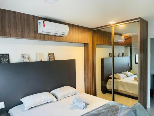 Ein Bett oder Betten in einem Zimmer der Unterkunft Edifício Time Apto 1022 - Ponta Verde