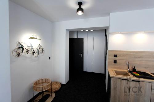 Η κουζίνα ή μικρή κουζίνα στο Lyck Apartamenty