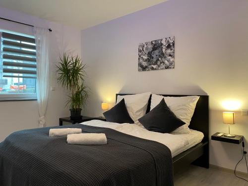 Кровать или кровати в номере StayCozy Bike&Ski Apartments, barrierefrei, free WIFI, Netflix, Erdgeschoss,