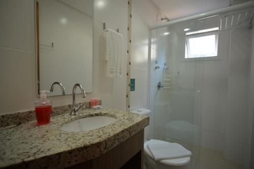 Um banheiro em Pousada Villa Maciel