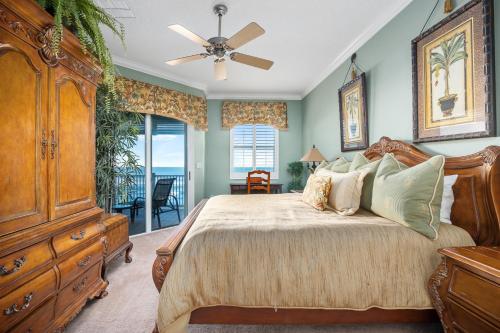 a bedroom with a bed and a ceiling fan at 852 Cinnamon Beach in Palm Coast