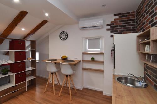 Kuchyň nebo kuchyňský kout v ubytování Studio apartmani Bethel