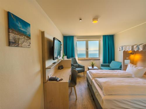 Postel nebo postele na pokoji v ubytování Hotel Seelust