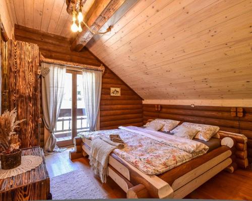 Postel nebo postele na pokoji v ubytování Luksuzna kuća za odmor RINA