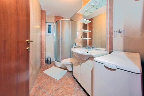 Koupelna v ubytování Apartments Sumic