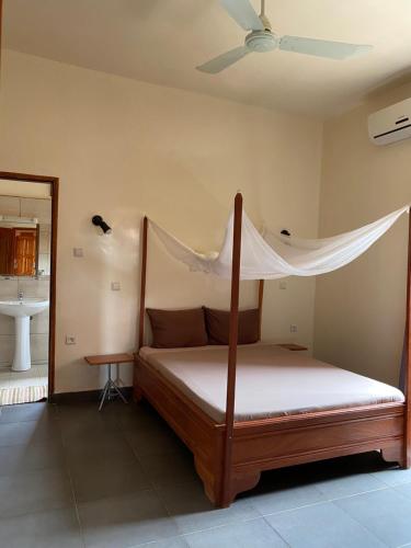 En eller flere senge i et værelse på Résidences Ouadada