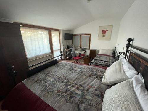 Postel nebo postele na pokoji v ubytování C'era Una Volta B&B