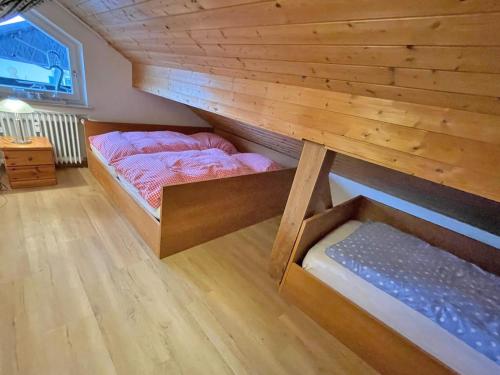 Uma cama ou camas num quarto em Alpenblick