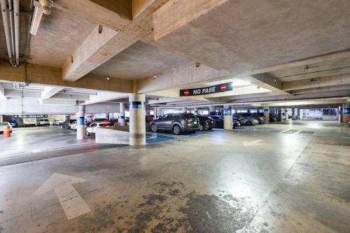 an empty parking garage with cars parked in it at Antigua Hotel Boutique in Mexico City