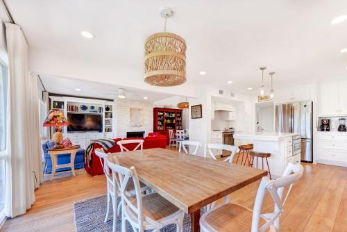 a kitchen and living room with a wooden table and chairs at Ponte Vedra Deer Run 9770 in Ponte Vedra