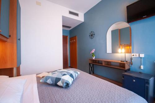 Postel nebo postele na pokoji v ubytování Hotel Crystal