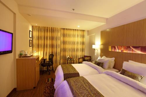Comfort Inn Legacyにあるベッド