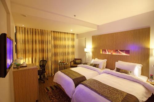 Comfort Inn Legacyにあるベッド