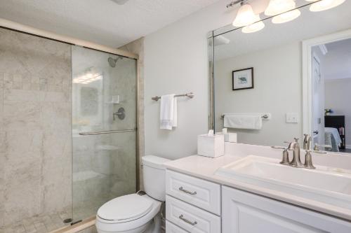 a bathroom with a toilet and a shower and a sink at Beaches n Fairway Getaway in Ponte Vedra