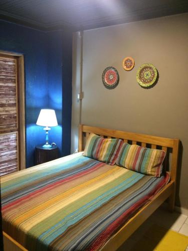 Una cama o camas en una habitación de Casa Alma Zen - Hostel Boutique & Bistrô Ubatuba