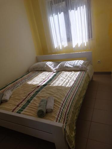 Postel nebo postele na pokoji v ubytování Ravni