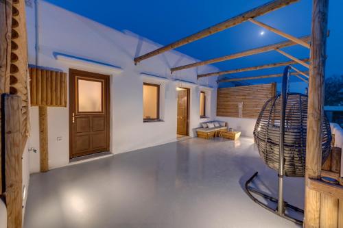 a view of a living room in a house at Endless Blue from Syros - Vari Resort in Vári