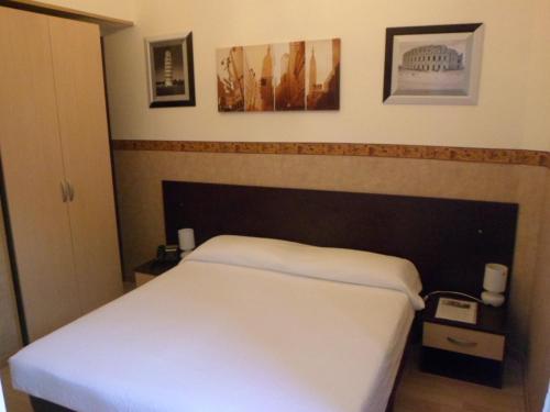 Katil atau katil-katil dalam bilik di Hotel Liberty