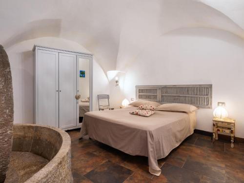 A bed or beds in a room at Apartment Mulino Rossi - PTB170 by Interhome