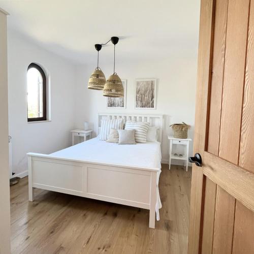Katil atau katil-katil dalam bilik di Island House Osljak