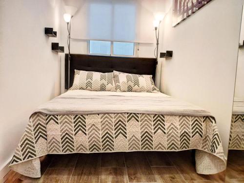 Katil atau katil-katil dalam bilik di Apartamento Estrella de Mar