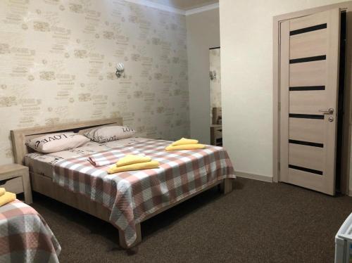 Cama o camas de una habitación en Guest House u Adama
