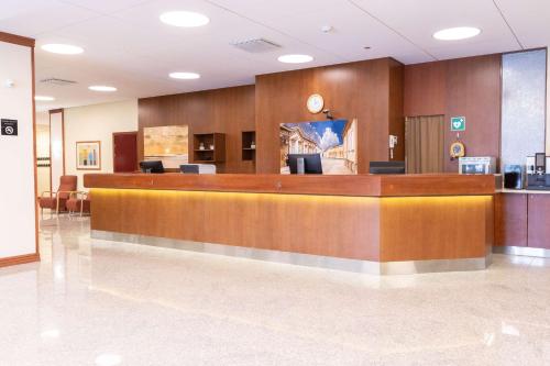 a lobby of a hospital with a reception desk at Scandic Rauma in Rauma