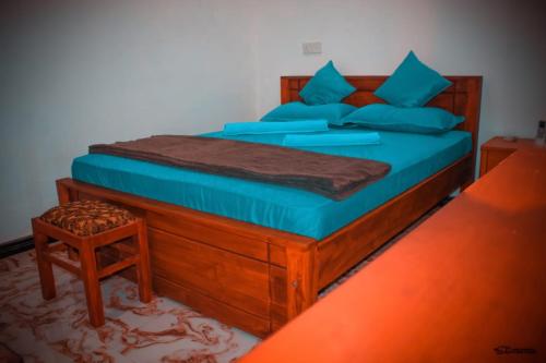 מיטה או מיטות בחדר ב-Virgin Forest Inn