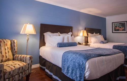 Ένα ή περισσότερα κρεβάτια σε δωμάτιο στο Regency Inn in Los Angeles