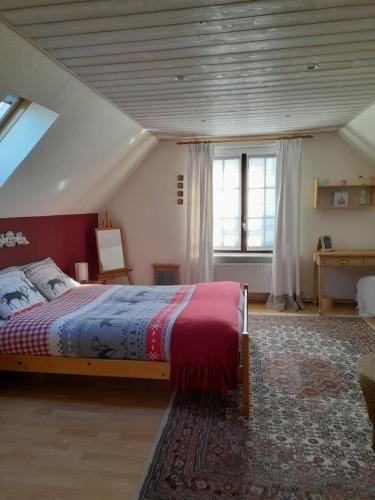 Ένα ή περισσότερα κρεβάτια σε δωμάτιο στο Les Pensées