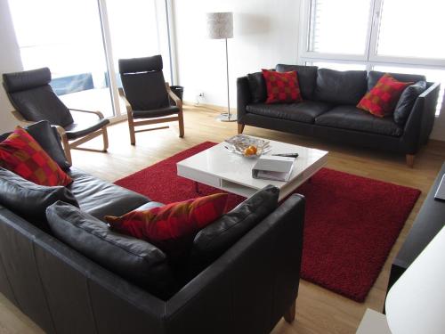 a living room with a couch and a coffee table at Ferienwohnung Jones in Pany