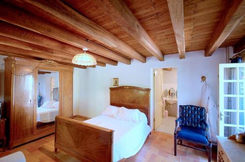 Llit o llits en una habitació de Les Grozilles