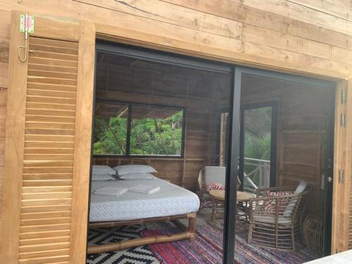 Voodi või voodid majutusasutuse Natura luxury camp toas