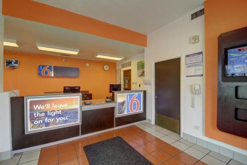 a waiting room at a hospital with a reception counter at Motel 6-San Antonio, TX - Downtown - Market Square in San Antonio